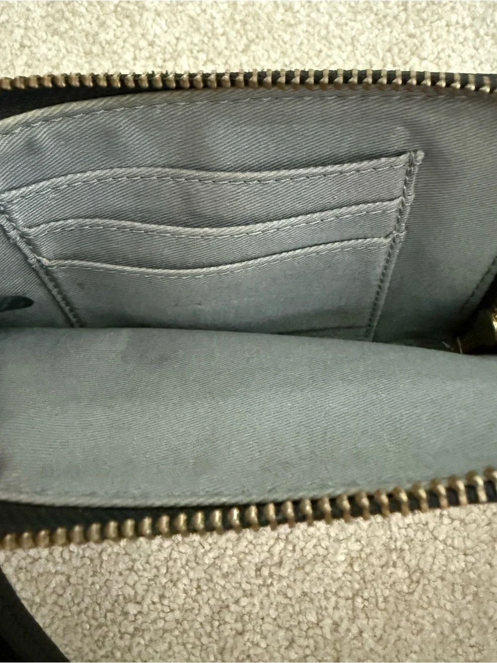 Fossil Black Pebbled Leather Wristlet with Red Tassel Accent